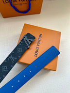 Louis Vuitton monogram belt with blue strap, silver buckle, and punched holes