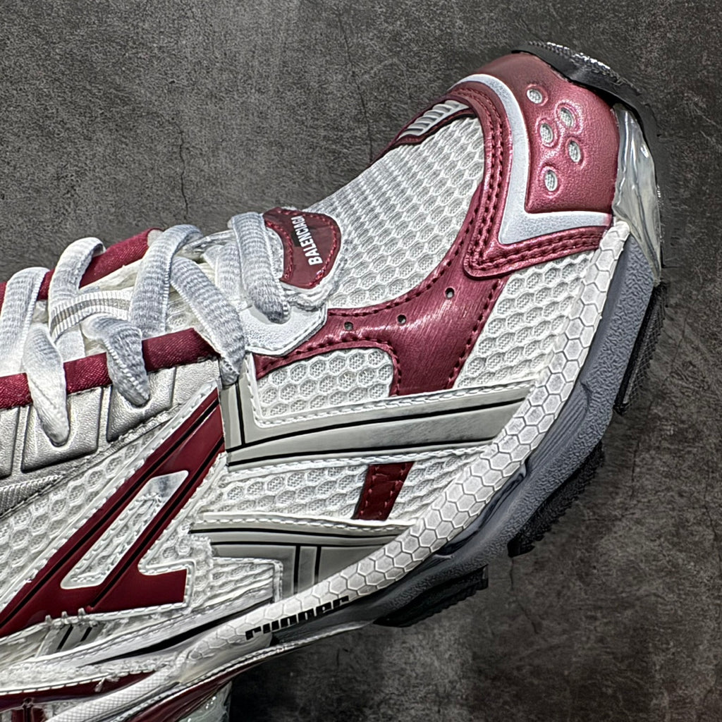 Balenciaga unisex running shoes, white and burgundy, side panel detail close-up