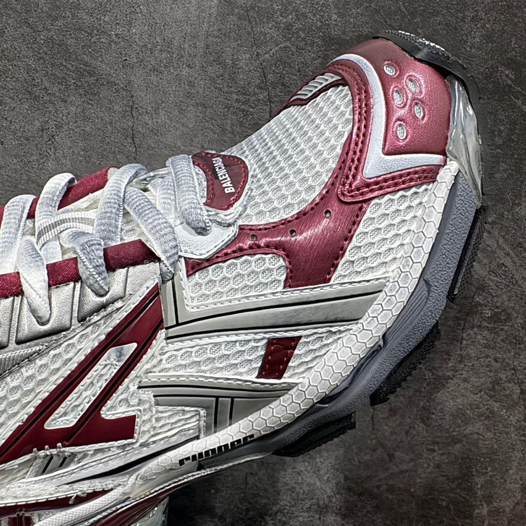 Balenciaga unisex running shoes, white and burgundy, side panel detail close-up