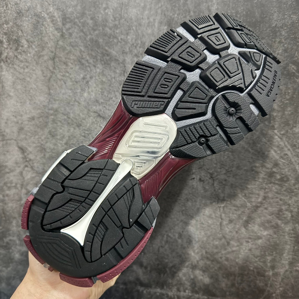 Balenciaga unisex running shoes, white and burgundy, outsole tread view
