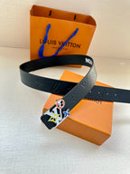 Louis Vuitton belt with multicolor charm buckle across box on dark navy strap