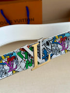 Belt buckle close-up on white strap with multicolor graphic print