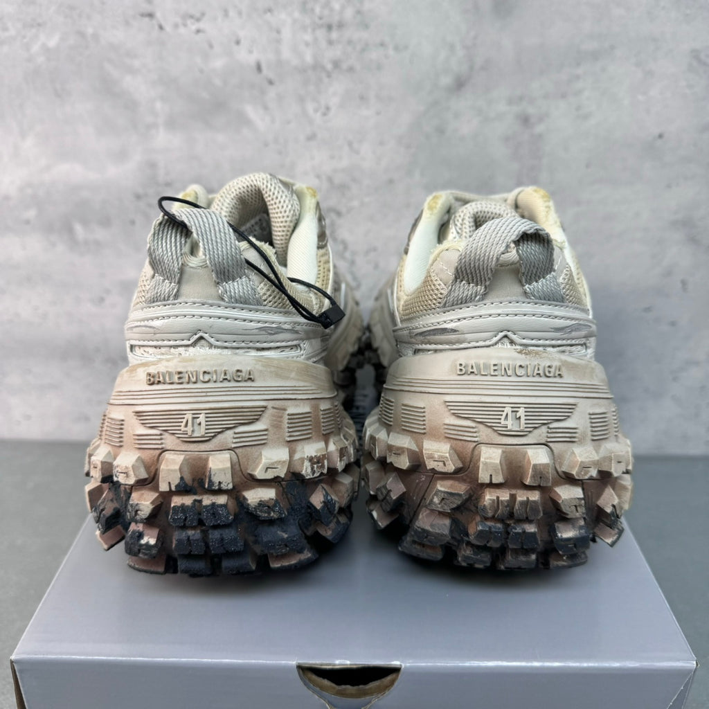 Balenciaga unisex sneakers back view, light upper with textured tread outsole