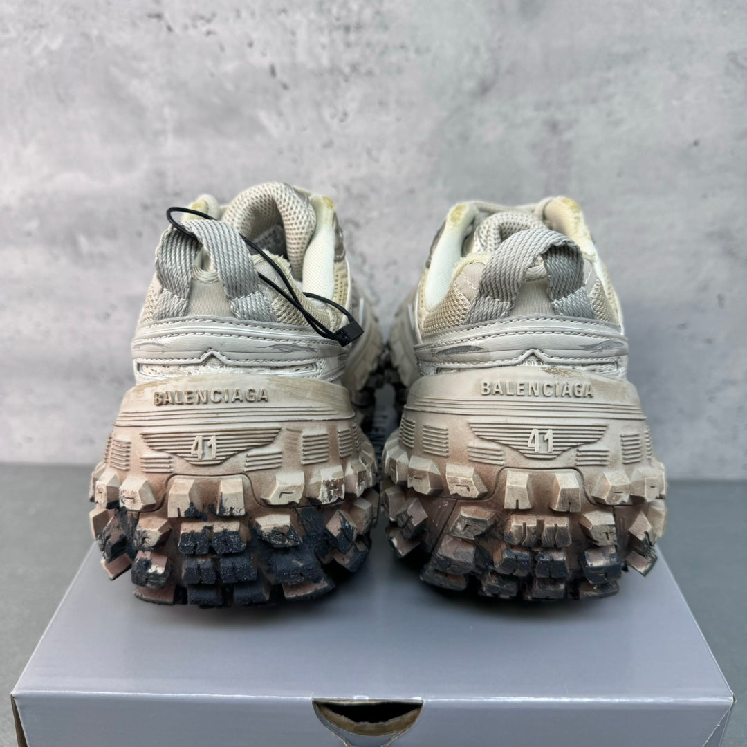 Balenciaga unisex sneakers back view, light upper with textured tread outsole