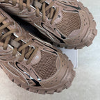 Close-up of Balenciaga track shoes side, perforated mesh, lace eyelets, and lug sole