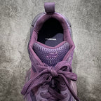 Purple sneakers interior view with Balenciaga logo and lace detail at opening