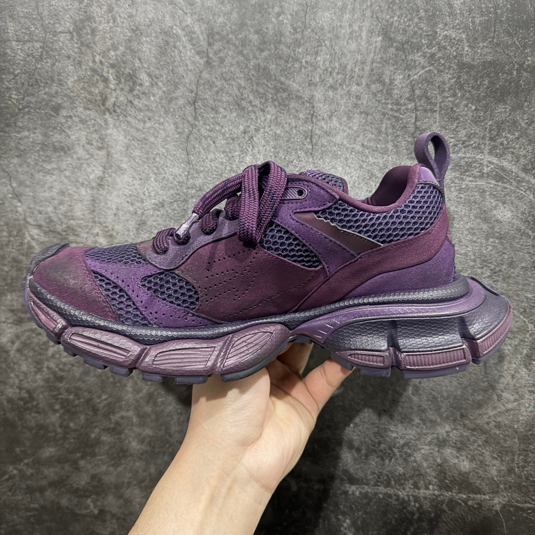 Purple lace-up sneakers with mesh panels and chunky rubber sole