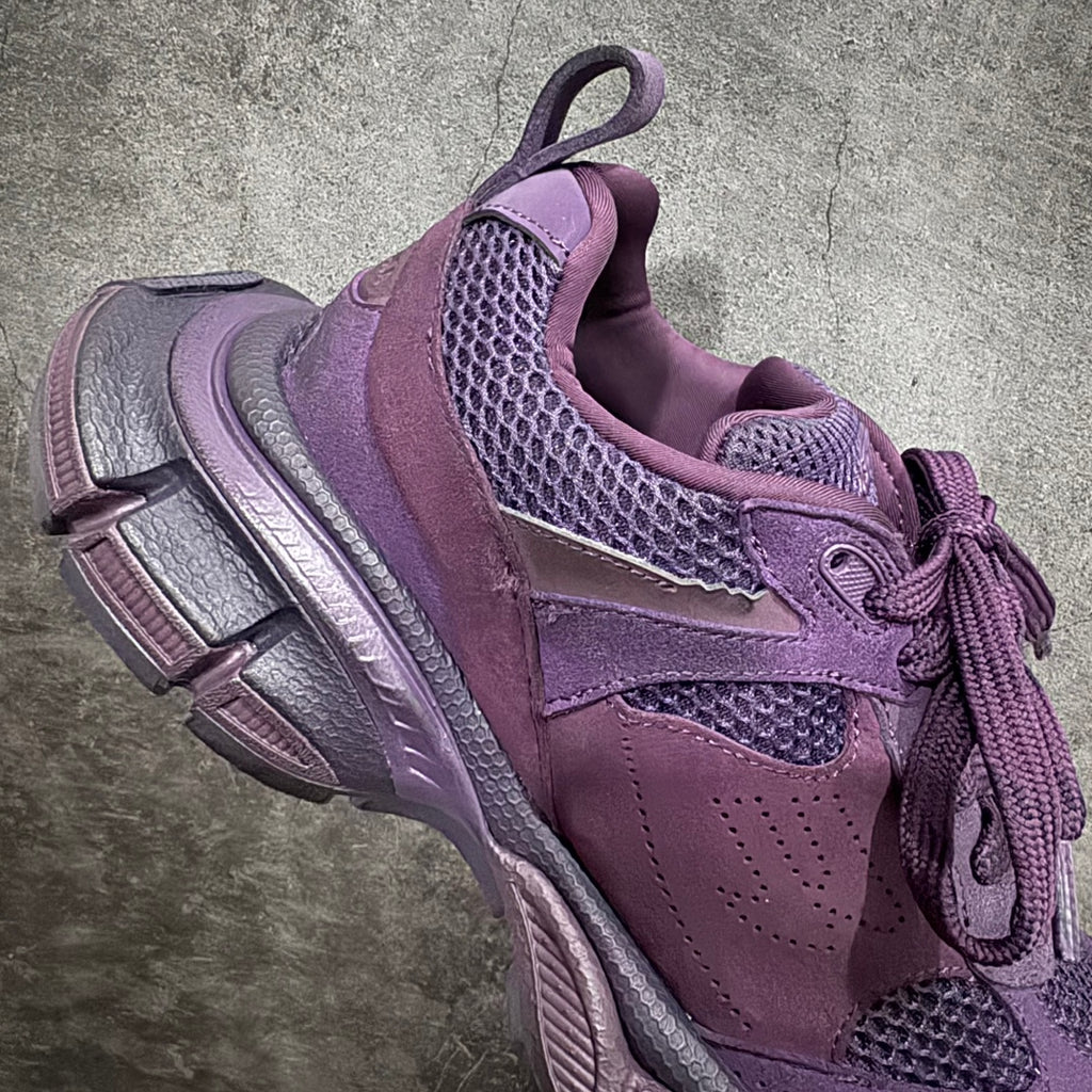 Purple lace-up sneaker with mesh quarter panel and sculpted side sole unit