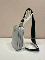 Prada mini crossbody bag, light gray with vertical zip pocket and black strap