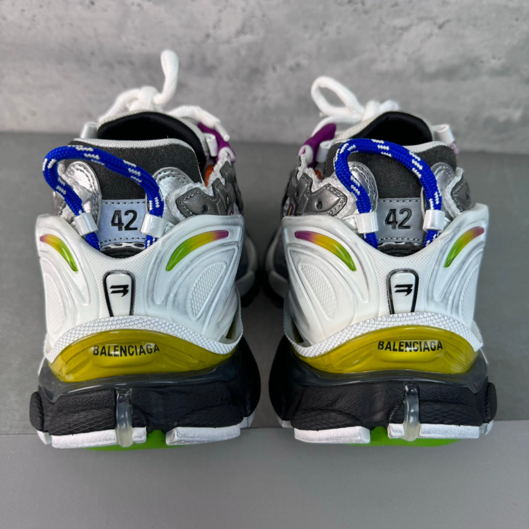 Balenciaga unisex sneakers back view: white mesh with blue heel tab and green/yellow sole