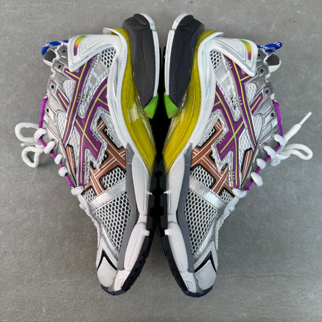 Balenciaga unisex sneakers front view: silver mesh with purple accents, brown stripe, and lime-yellow midsoles