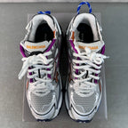 Balenciaga unisex sneakers on box: white mesh with purple panels and white laces, blue pull tabs