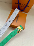 Louis Vuitton belt with green and gray monogram straps and silver buckle with charms