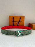Louis Vuitton belt with green monogram canvas and red underside, silver-tone LV buckle