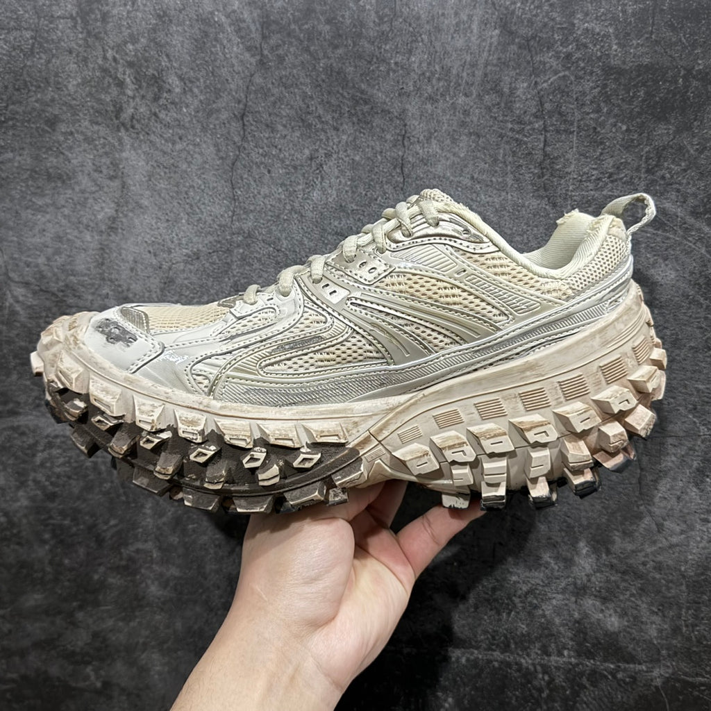 Balenciaga unisex sneakers side view, off-white upper with thick grip lug outsole