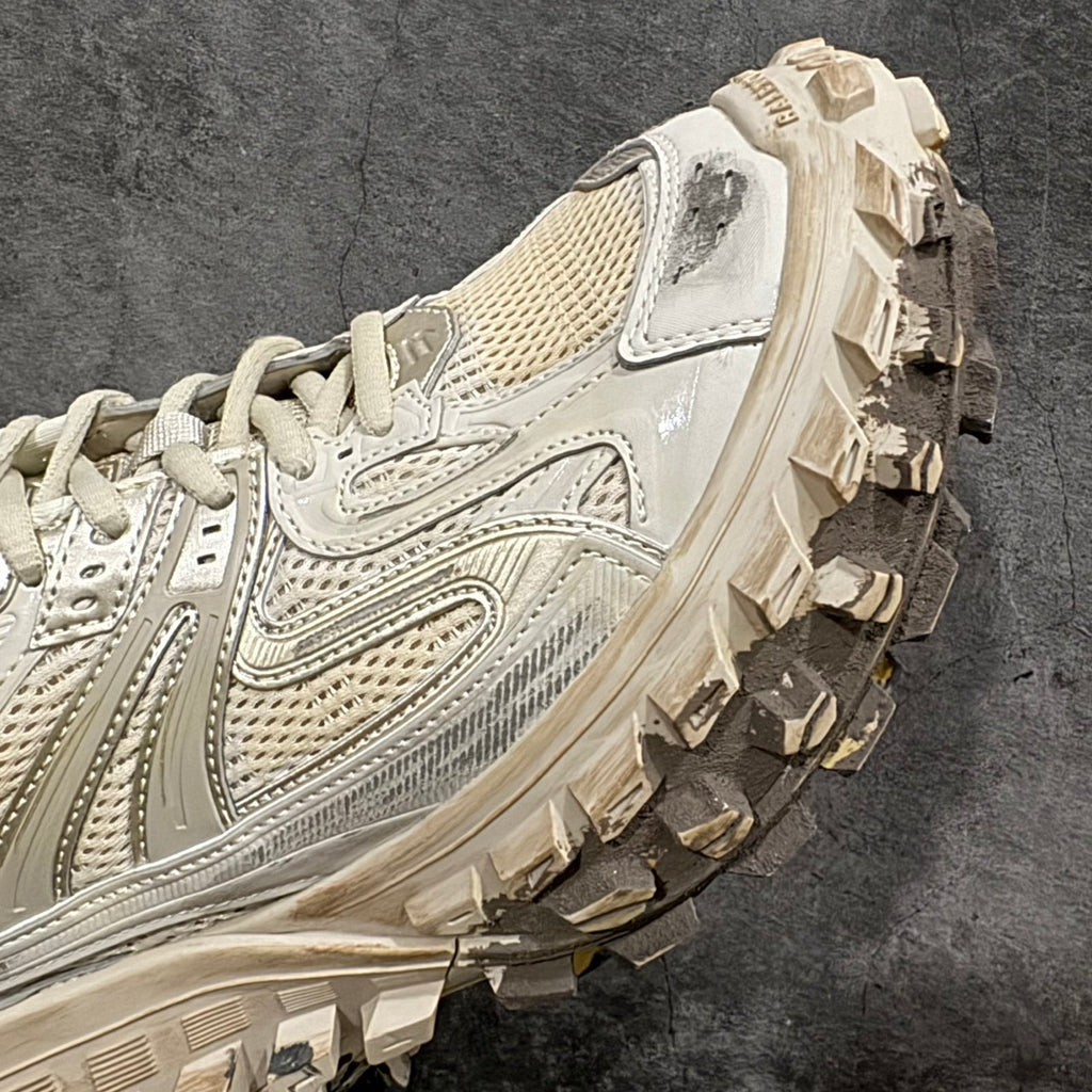 Balenciaga unisex sneakers quarter view, off-white upper with chunky lug outsole