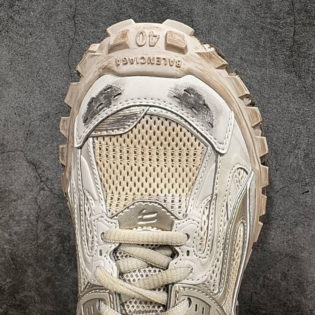 Balenciaga unisex sneakers toe view, off-white mesh panel with lace and lug tread