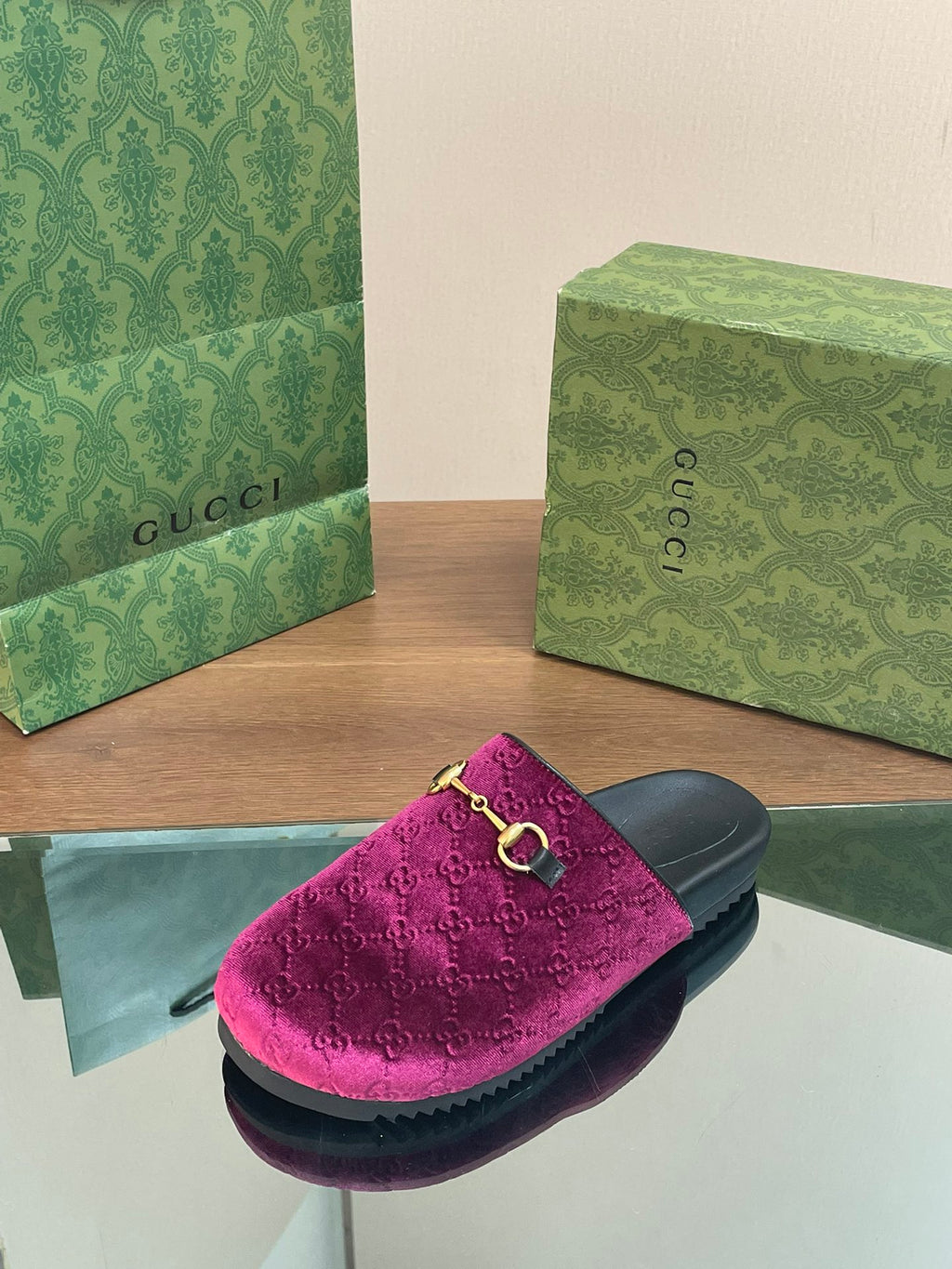 Single pink velvet slide sandal with gold horsebit, black sole and footbed
