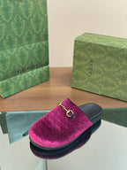 Single pink velvet slide sandal with gold horsebit, black sole and footbed
