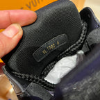 Louis Vuitton trainer shoe size label on black textured tongue with braided laces
