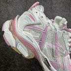 Balenciaga unisex sneaker side view with white upper and pink diagonal stripes