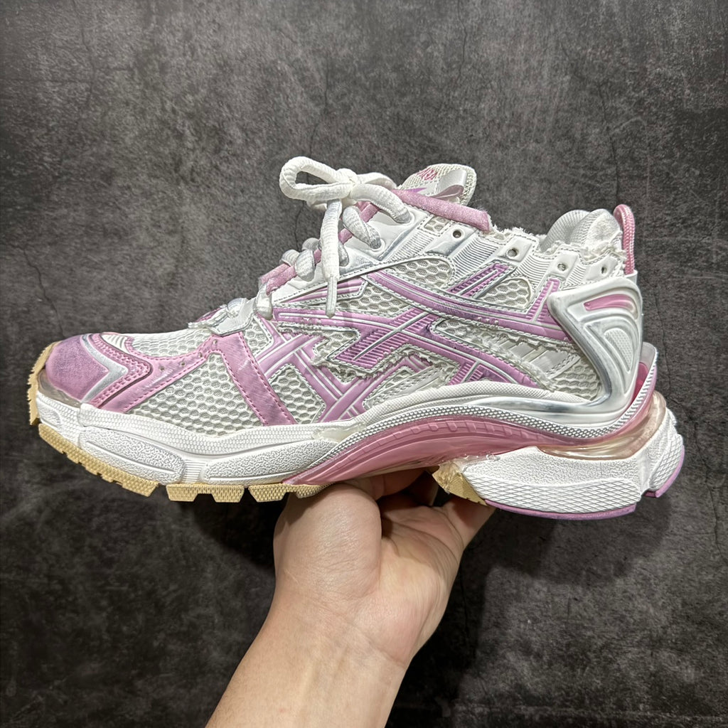 Balenciaga unisex sneaker side view, white and pink with textured panels