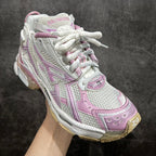 Balenciaga unisex sneaker front view in white and pink with lace-up