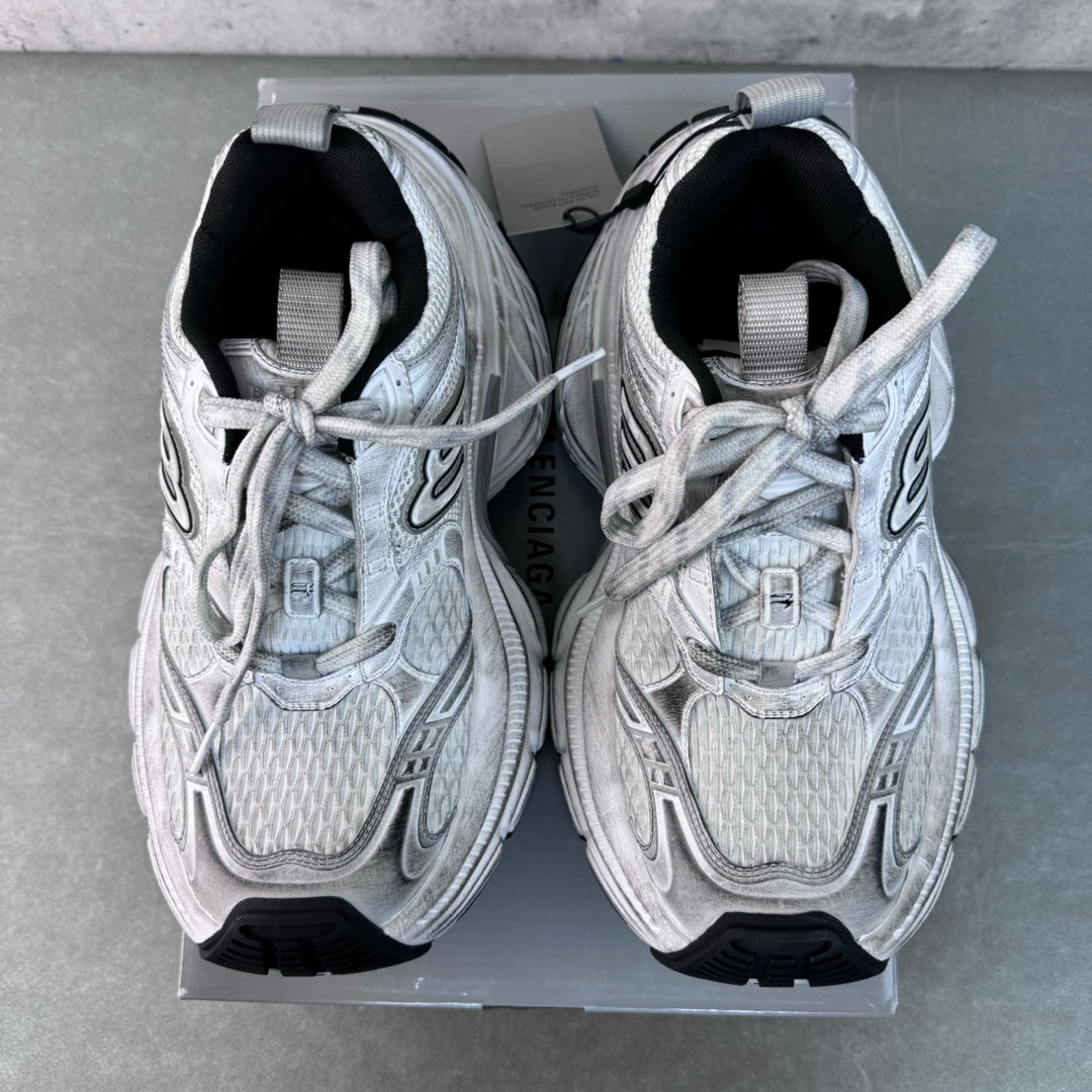 Balenciaga unisex sneakers pair, light gray uppers with black interior and laces
