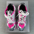 Balenciaga Runner sneakers pair front, white with bright pink panels and black heel details