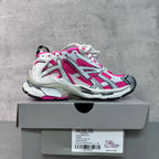 Balenciaga Runner sneakers on box, white/pink/black lace-up with thick tread sole