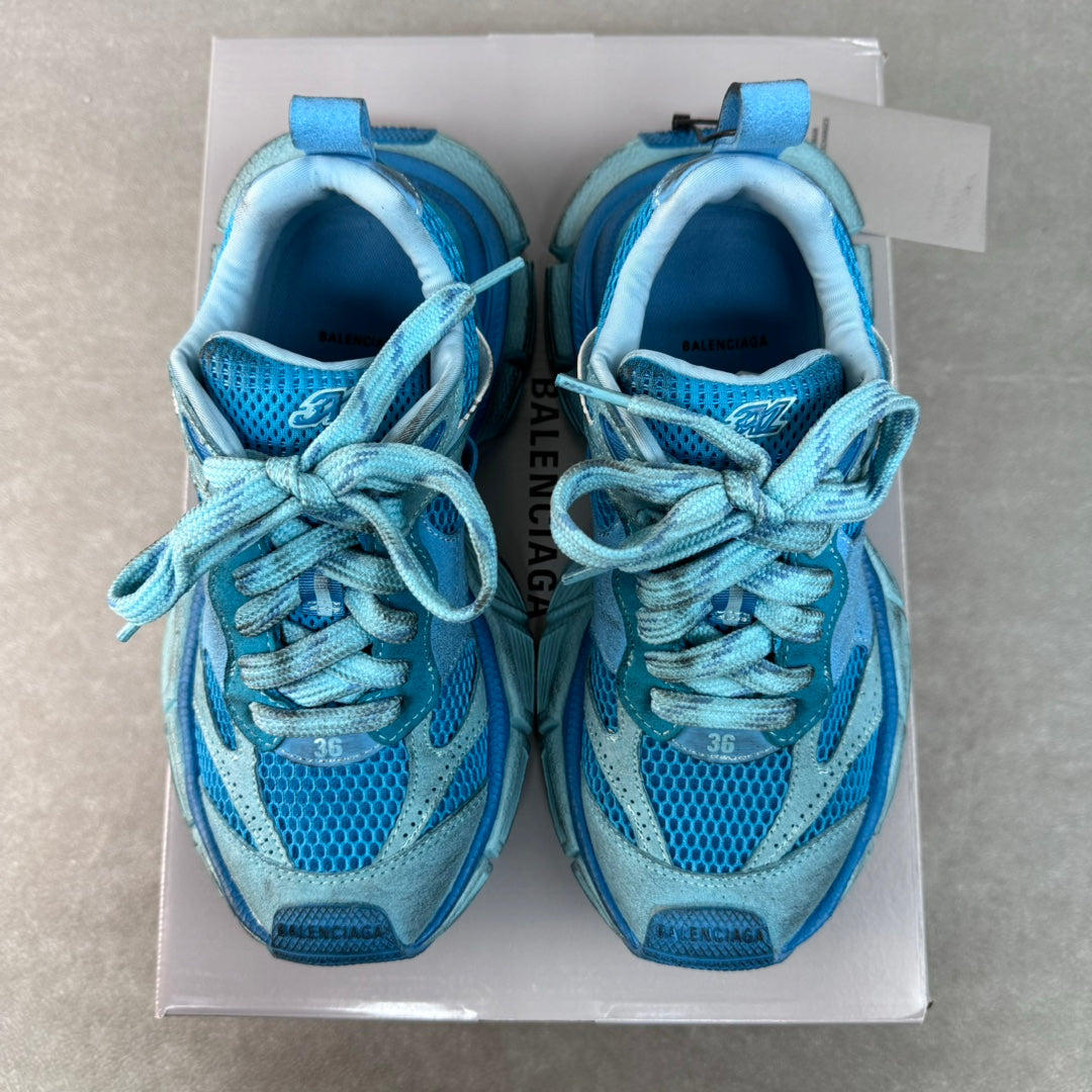Unisex blue sneakers with laces, padded tongue, and breathable mesh lining