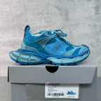 Unisex blue lace-up sneakers with perforated mesh upper and padded collar