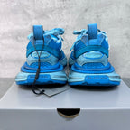 Unisex blue sneakers with rear pull tabs, lace-up closure, and cushioned heel
