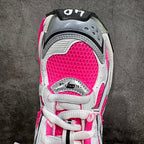 Toe and lace area of unisex sneakers, hot pink mesh and white leather trim