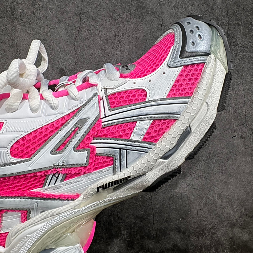 Unisex sneakers side view, pink and white uppers with textured gray outsole