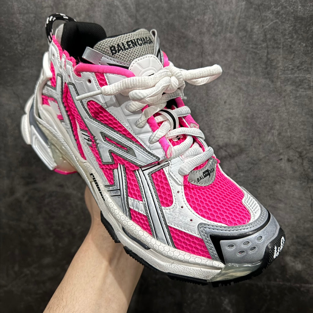 Unisex sneakers with white leather, hot pink mesh, and gray ribbed side panels