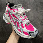 Unisex sneakers with white leather, hot pink mesh, and gray ribbed side panels