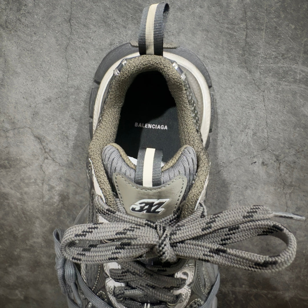 Balenciaga sneakers front view with open collar, gray knit lining, lace-up ties