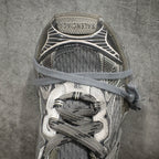 Balenciaga sneakers tongue and heel view, gray woven texture, lace-up closure