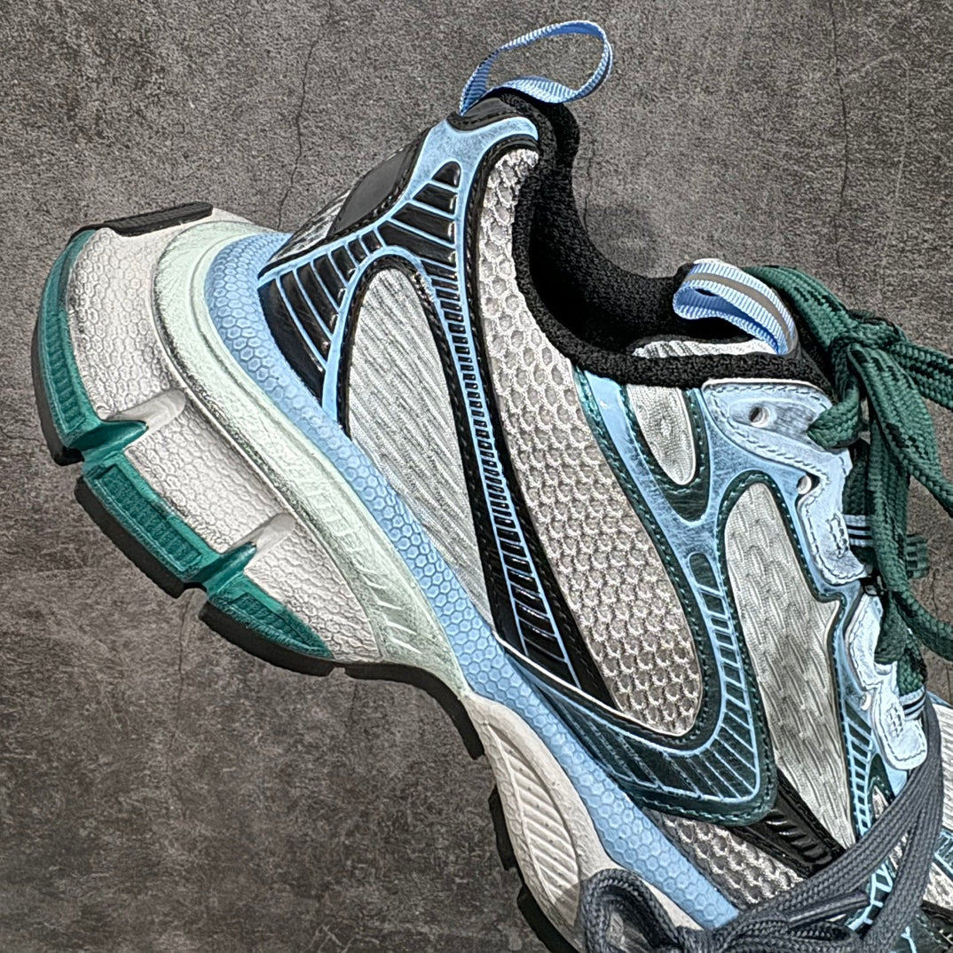 Balenciaga unisex sneakers three-quarter view with green laces and light blue mesh upper
