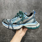 Balenciaga unisex sneakers side view in light blue, white and green with textured sole