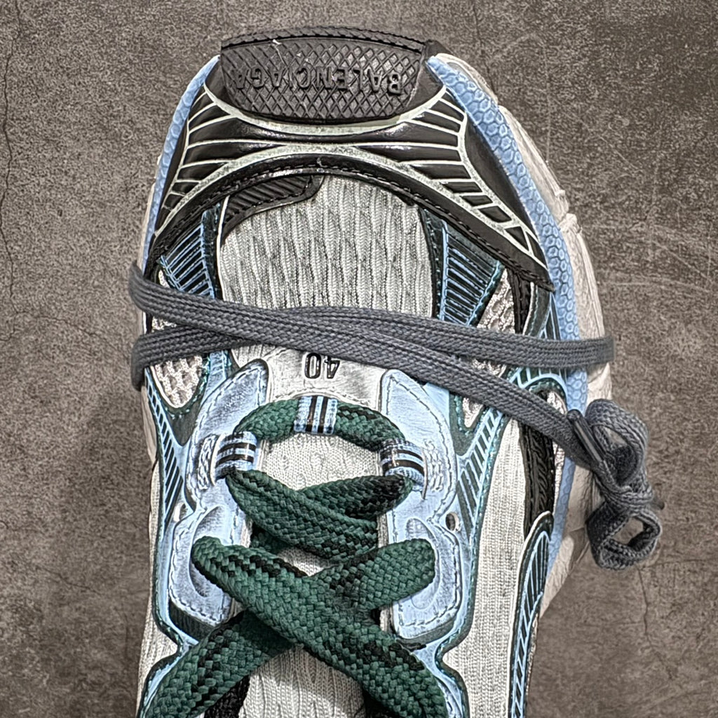 Balenciaga unisex sneakers top view with green laces and patterned light blue panels