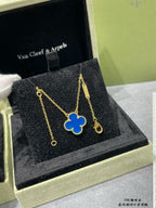 Van Cleef & Arpels clover necklace and drop earrings, gold with blue enamel