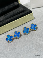 Set of four blue clover stud earrings with gold-tone frames