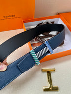 Blue leather belt strap with striped buckle and gold-toned H clasp.