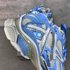 Balenciaga unisex chunky sneaker with blue heel and side stripes, white and light blue