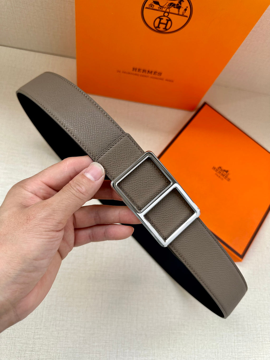 Taupe leather belt with double square buckle set in silver-tone frames