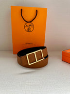 Hermes belt with tan leather strap and gold-tone double square buckle