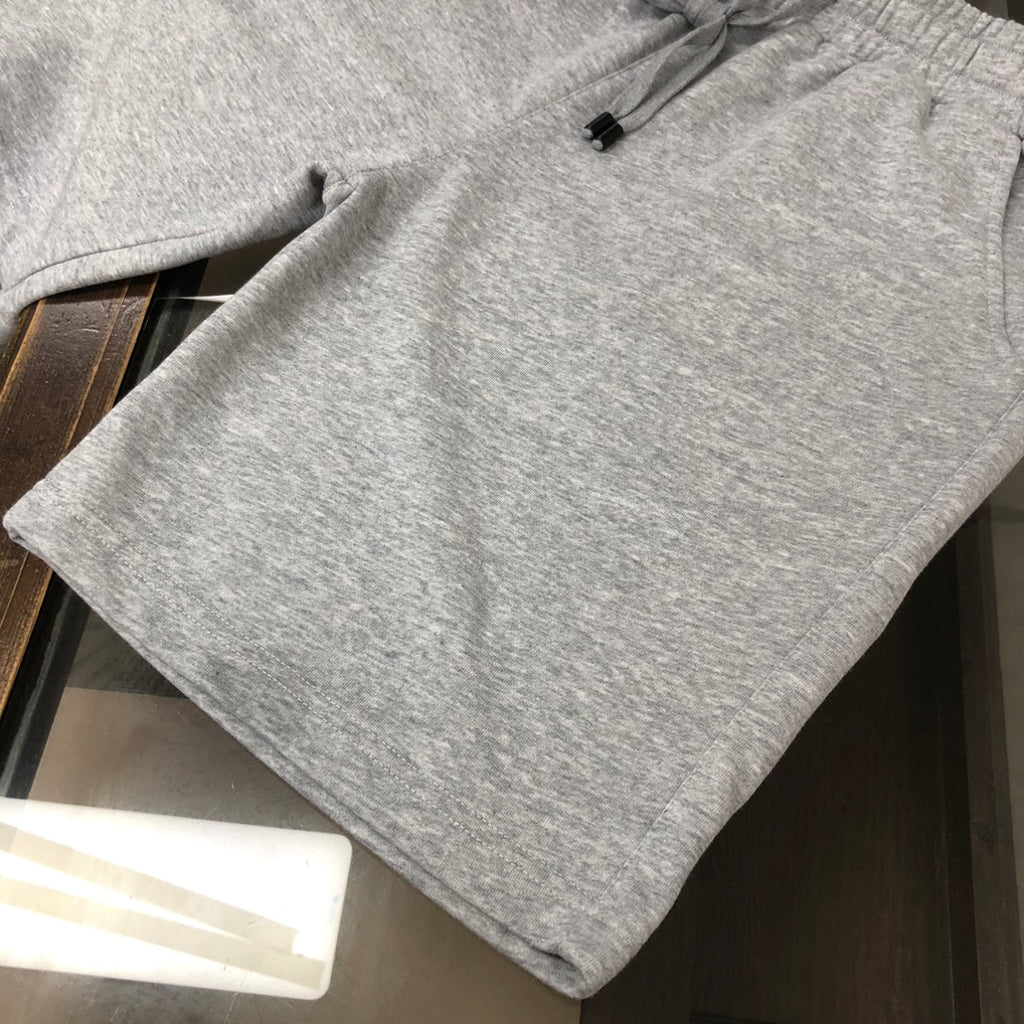 Light gray sweat shorts with drawstring and side seam pocket