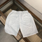 Heather gray shorts with elastic waistband, back view.